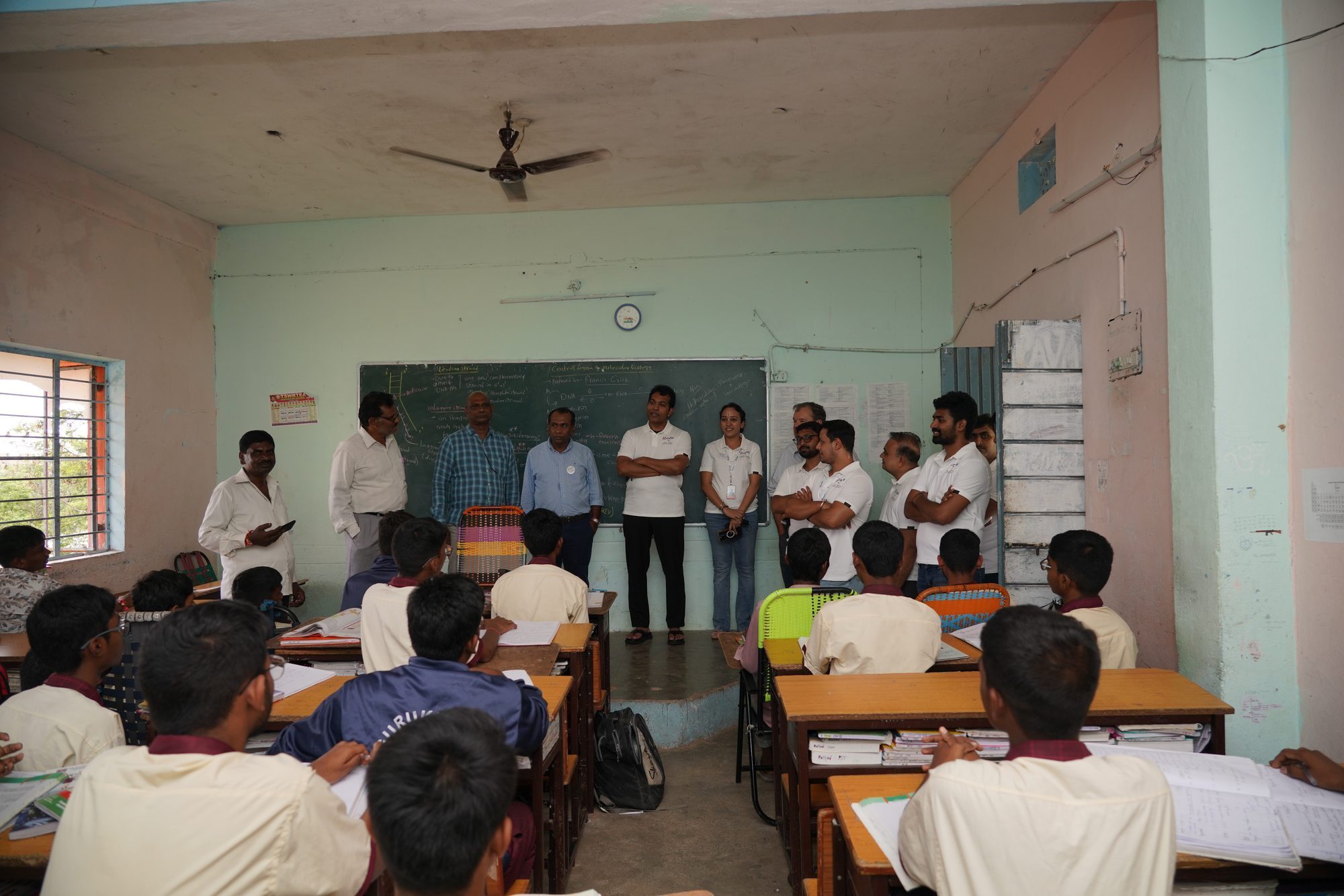 Ceipal and Nigama Foundation team with students during classroom education visit — August 2024