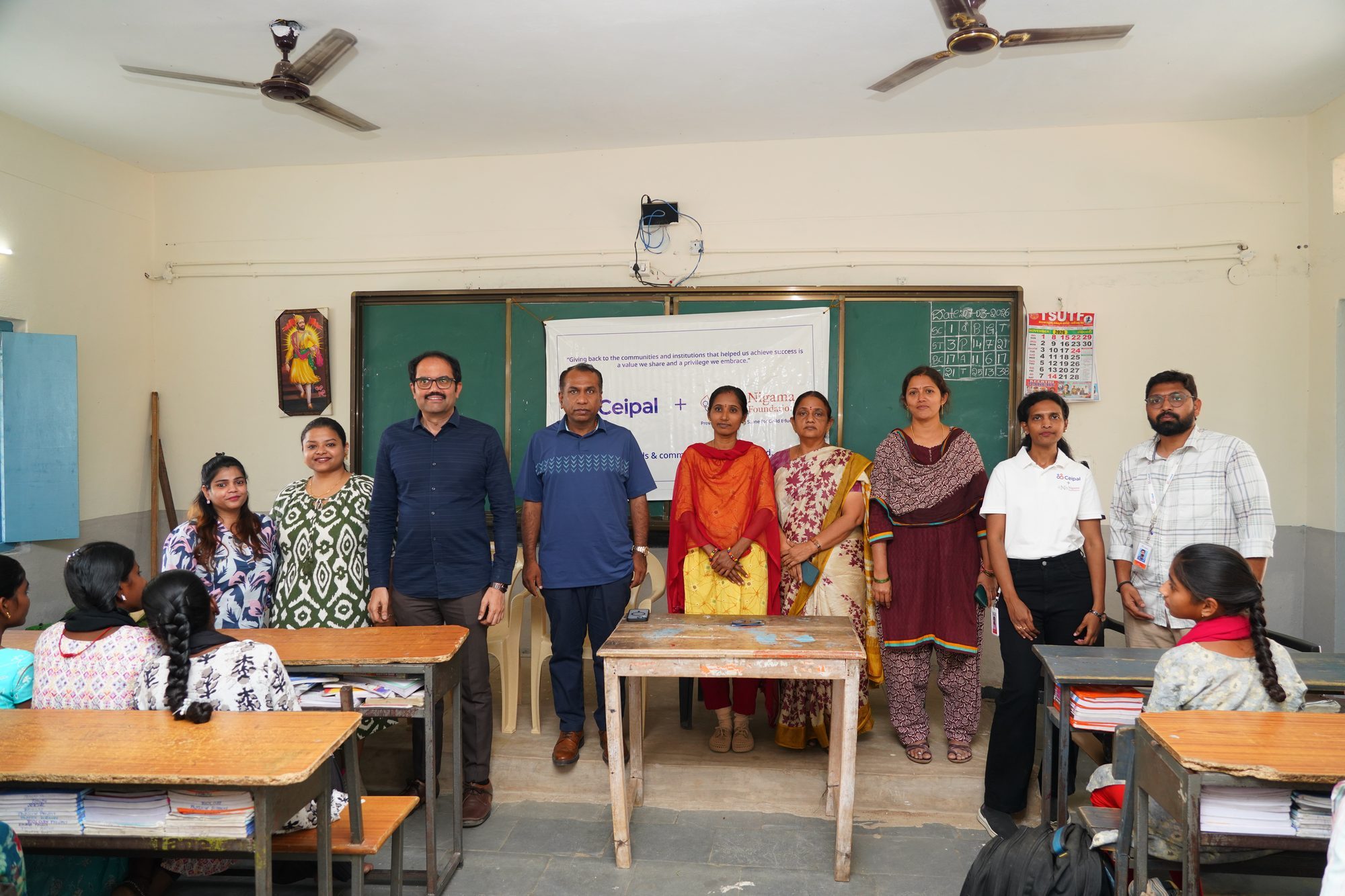 Ceipal and Nigama Foundation team with teachers — classroom education visit, March 2026