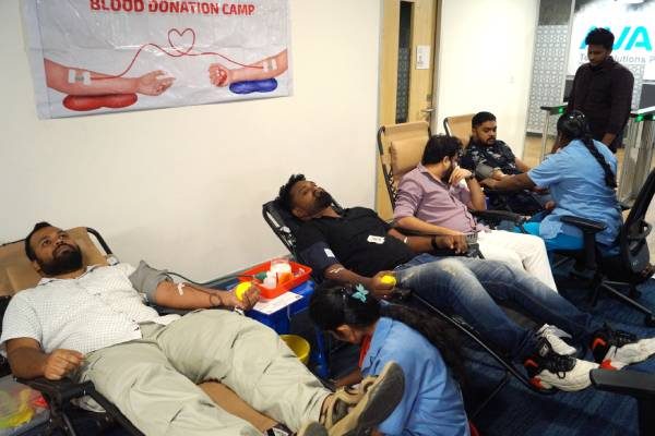 Employee donating blood at the Visakhapatnam office blood donation camp