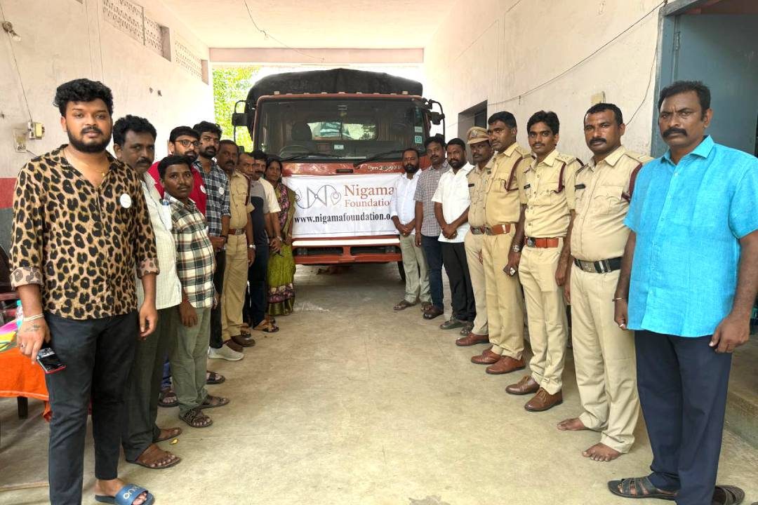 Flood survivors receiving essential relief supplies in Vijayawada