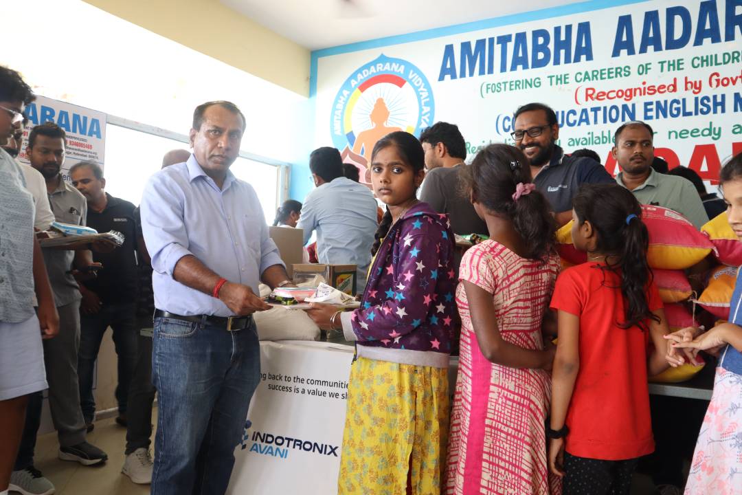 Nigama Foundation distributing school supplies to students